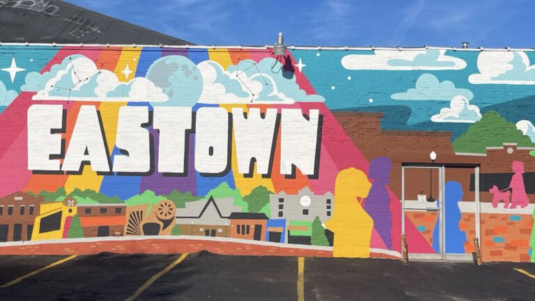 Eastown pickup location in Grand Rapids featuring a colorful mural near safe, well-lit nighttime transportation areas