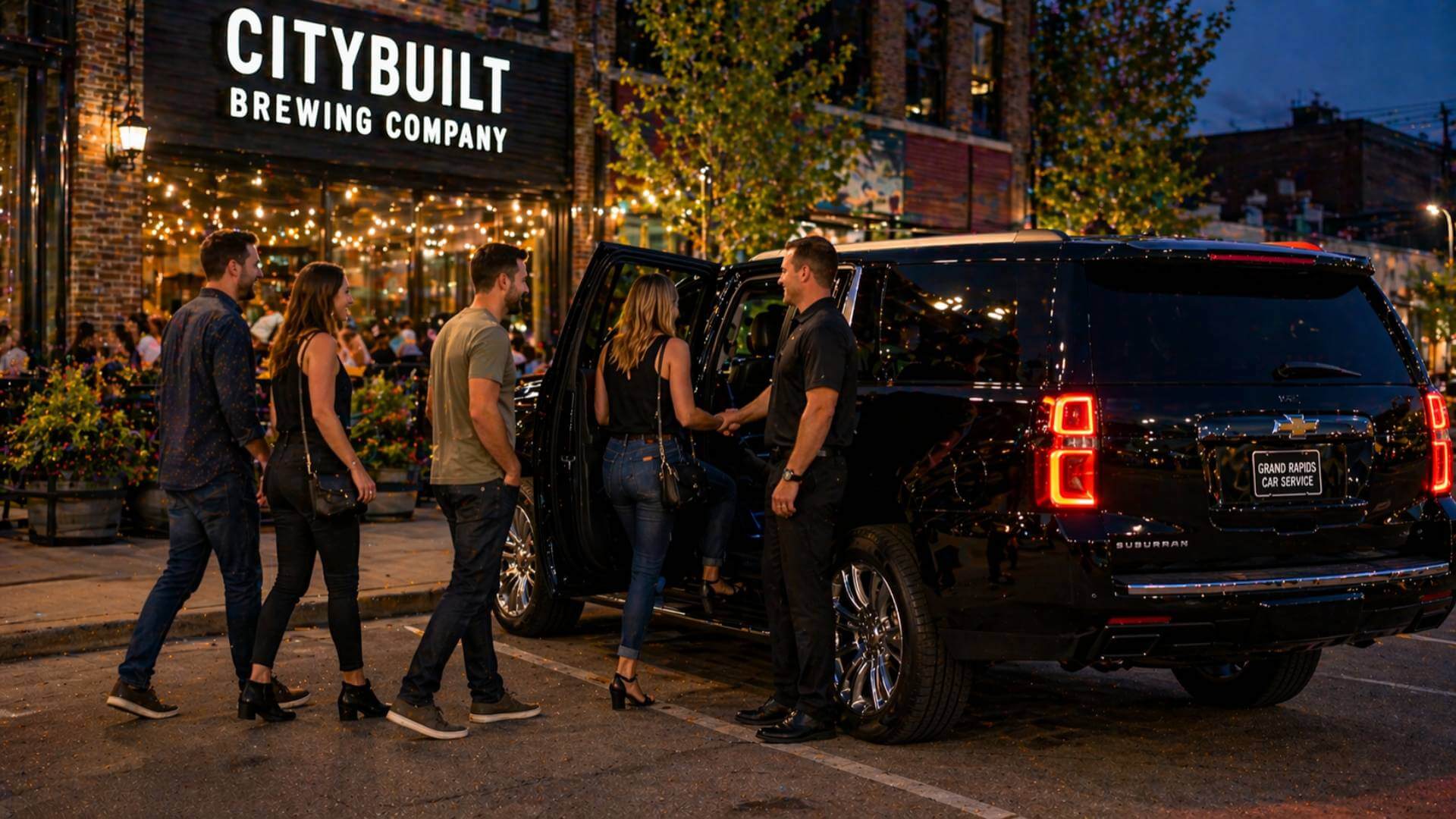 Grand rapids brewery tour transportation group entering vehicle at brewery
